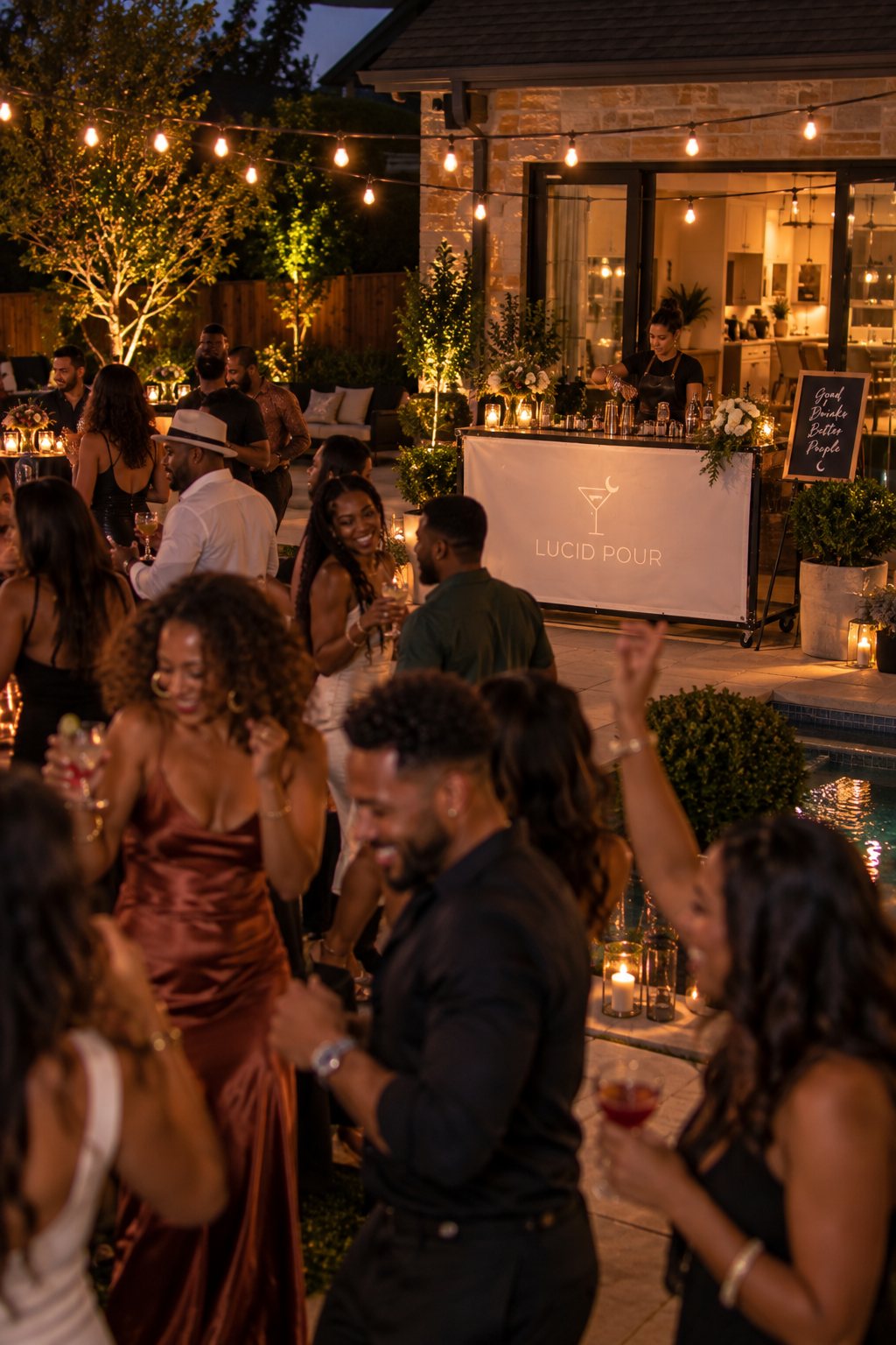 Portable mobile bar set up on a backyard patio with a party in full swing